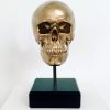 Gold Skull on Plinth by Haus of Skulls